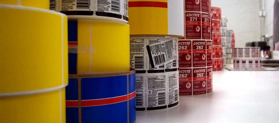 Stacks of custom-printed labels at the Penmar facility
